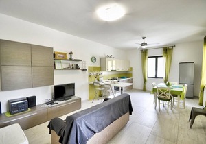 Villa Olga A: A cozy and welcoming apartment that is part of a villa situated in a quiet location, a few minutes from the town center, with Free WI-FI.