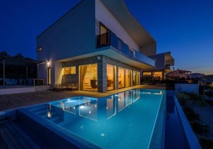 Villa Ramarin 1 with heated pool, jacuzzi and sauna by the sea in Rogoznica
