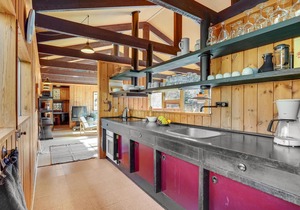 Visit this charming wooden house surrounded by wonderful nature.