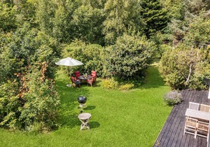 Visit this charming wooden house surrounded by wonderful nature.
