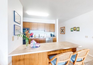 Wailua Bay View condo near surf & sand with pool, ocean views & W/D
