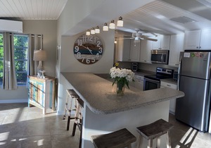 Walk to Marco's beautiful white sand beach or lounge by your private pool.