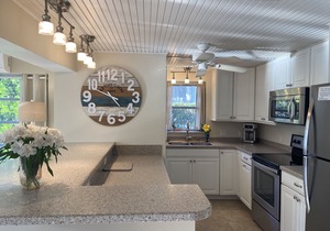 Walk to Marco's beautiful white sand beach or lounge by your private pool.
