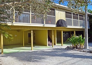 Walk to the Beach and More from this Fully Renovated Unit W/Heated Pool