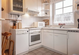 Warm and with some extras: In the ground floor apartment with its approx.