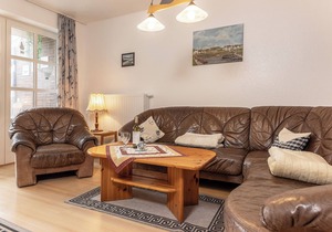 Warm and with some extras: In the ground floor apartment with its approx.