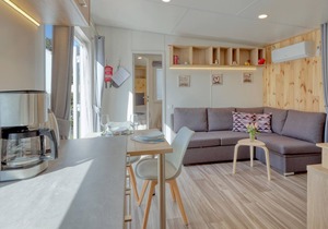 Welcome to this modern vacation home with panoramic views of the lake!