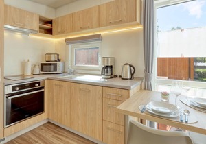 Welcome to this modern vacation home with panoramic views of the lake!