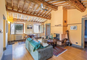 Well-maintained and elegant part of a two-family house with extensive garden and pool, about 10 km f