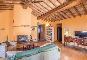 Well-maintained and elegant part of a two-family house with extensive garden and pool, about 10 km f