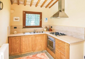 Well-maintained and elegant part of a two-family house with extensive garden and pool, about 10 km f