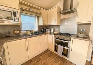 Wonderful 6 berth caravan for hire by a stunning Norfolk beach ref 19006SD