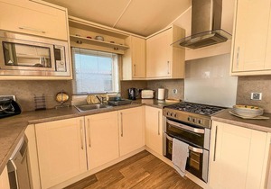 Wonderful 6 berth caravan for hire by a stunning Norfolk beach ref 19006SD