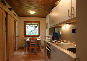 Wooden bungalow with oven, in Oberharz near a lake