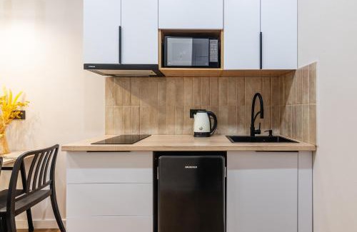 Almaty Apartment | Светлая квартира-студия в 5-минутах от Мега Парк