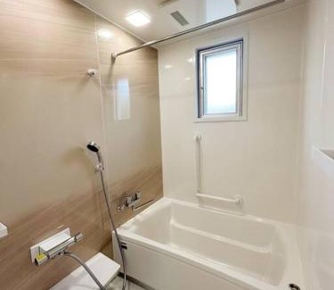 Nago House | 北部観光アクセス良好な新築貸別荘/最大4名ベッド4台/Wi-Fi/海岸線近く