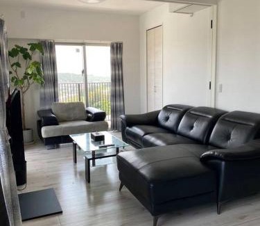 Kadena-cho Apartment | 沖縄ライカム徒歩3分マンション絶景な宿reposokinawa