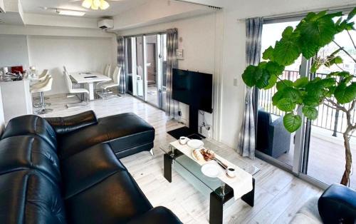 Kadena-cho Apartment | 沖縄ライカム徒歩3分マンション絶景な宿reposokinawa