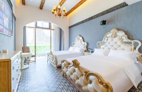 Xinghai Commercial Area House | 满月云朝夕民宿酒店