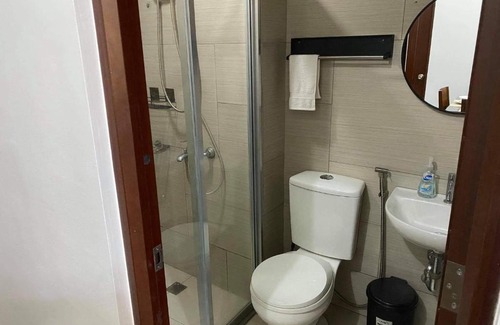 Muntinlupa Apartment | 1 bedroom condo unit with balcony, netflix wifi and pool