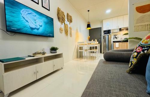 Puerto Princesa City Centre Apartment | 1 Bedroom Suite Condo with Balcony, Swimming Pool and Gym