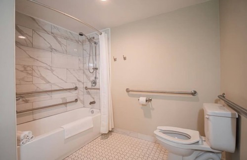 Ocala Hotel | 1 Queen Suite at Equus Inn, Pets Allowed, Seasonal Pool, Free Breakfast