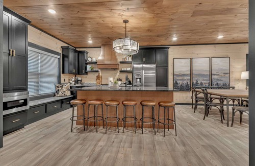 Sevierville Cabin | 10BR Luxury | 2 Cabins | Rooftop Lounges | Indoor Pools | Hot Tubs | Walk to Water Park | Sleeps 44