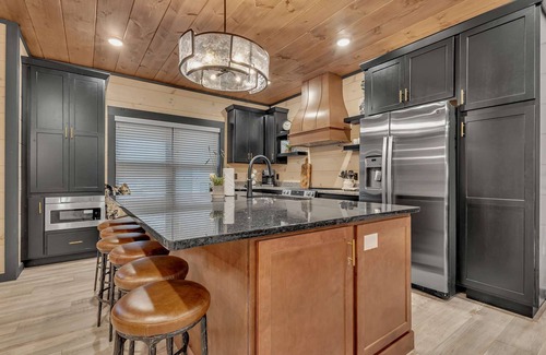 Sevierville Cabin | 10BR Luxury | 2 Cabins | Rooftop Lounges | Indoor Pools | Hot Tubs | Walk to Water Park | Sleeps 44