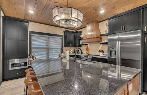 Sevierville Cabin | 10BR Luxury | 2 Cabins | Rooftop Lounges | Indoor Pools | Hot Tubs | Walk to Water Park | Sleeps 44