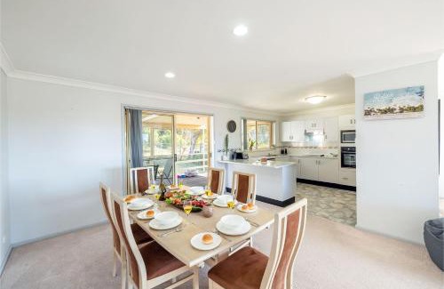 Fingal Bay House | 124 Rocky Point Rd - pet friendly, air con, Wi-Fi, high chair and Cot