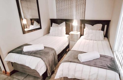 Bloemfontein Apartment | 18 on Basil