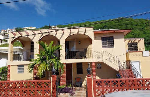 Frigate Bay Apartment | 1bdrn apt. with self checking and pet friendly.3min. walk to beach .