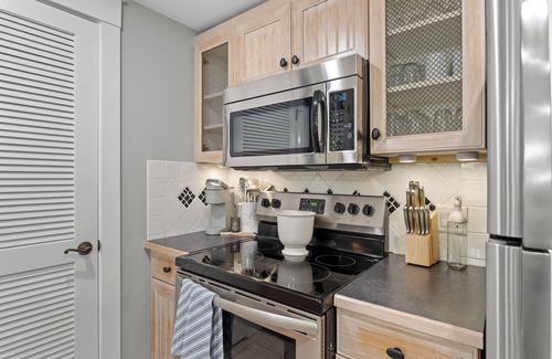 Baytowne Wharf Condo | 1BR Condo at Baytowne! Steps to Wharf, Tropical Pool & Hot Tub, Balcony View.