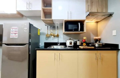 Bagong Lipunan Ng Crame Condo | 1BR w/balcony nr SM North/Parking/WIFI |Netflix