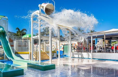 Mermaid Beach Apartment | 2-Bed Family Haven with Pools, BBQ & Playgrounds
