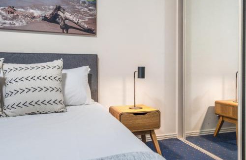 Mermaid Beach Apartment | 2-Bed Family Haven with Pools, BBQ & Playgrounds
