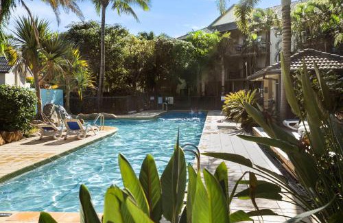 Mermaid Beach Apartment | 2-Bed Family Haven with Pools, BBQ & Playgrounds