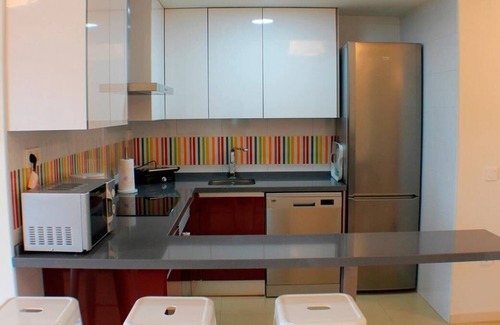 Torre de la Horadada Apartment | 2 bedroom apartment on the 1st line of the sea and community pools.