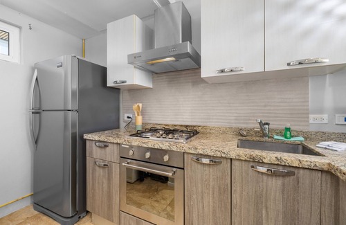 Boegoeroei Condo | 2 bedrooms and 2 baths in a tropical setting. Amazing outdoor spaces and a very convenient location. Less than 2 miles from stunning Eagle Beach and the High-rise hotel district with shopping, casinos and restaurants.