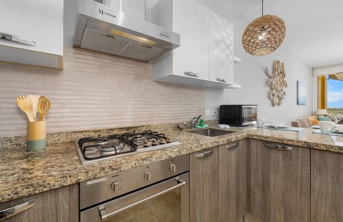 Boegoeroei Condo | 2 bedrooms and 2 baths in a tropical setting. Amazing outdoor spaces and a very convenient location. Less than 2 miles from stunning Eagle Beach and the High-rise hotel district with shopping, casinos and restaurants.