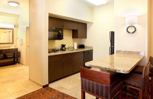Biggs Field Apartment | 2 Connecting Suites at a Hotel
