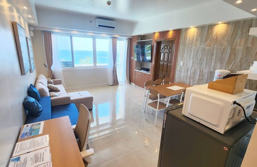Lapu-Lapu Condo | 2 Luxury 1 BR Condos next to each other/2pools-Gym- amazing ocean-views