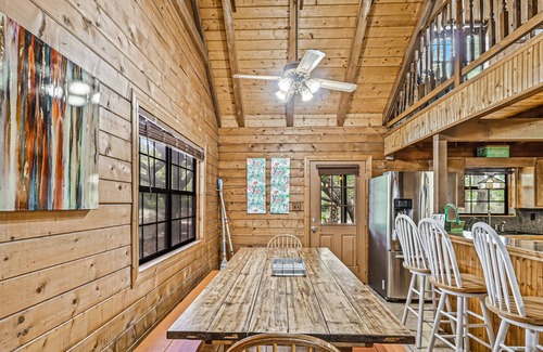 Rockport Cabin | 2-story cabin with an enclosed yard, patio, and large shade trees
