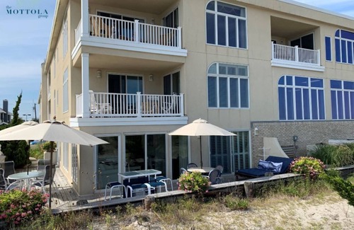 Stone Harbor Condo | 2-WEEK MINIMUM - Enjoy the sounds of the waves from this ground floor unit - Luxury Condo living in the heart of Stone Harbor.