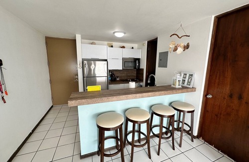 Guanajibo Condo | 20 steps from the beach! WiFi, fully airconditioned, gated community, sleeps 4