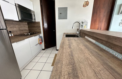 Guanajibo Condo | 20 steps from the beach! WiFi, fully airconditioned, gated community, sleeps 4