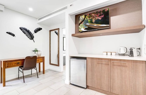 Palm Cove Apartment | 235 Temple Tranquility: Triton Retreat- Luxury Studio in Palm Cove | Private Stay with Resort Pools & Balcony