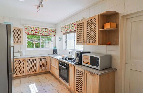 Voelklip House | 245 on 10th — Spacious Family Escape | Sea Views | Pizza Oven | Above Grotto Beach