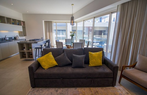 Emiliano Zapata Condo | 2BD/3BA Wrap Around Terrace Rooftop Pool Gym and Parking