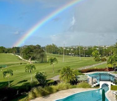 Callendar Apartment | 2Bed Modern Condo with AC, Pool, Rooftop patio, 5 Min to Beach
